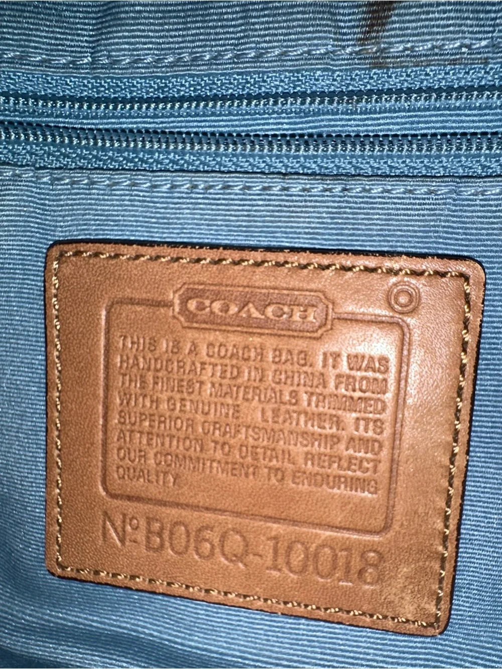 Coach Patchwork Signature Shoulder Bag with matching hat.